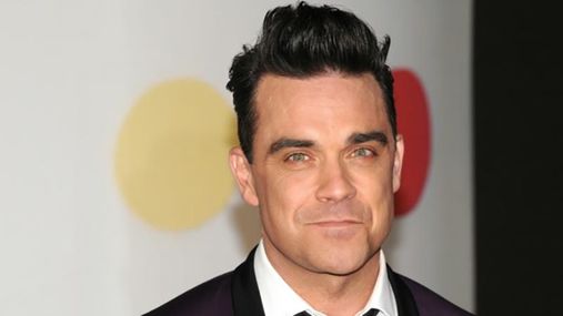 Певец Робби Уильямс впервые прокомментировал появление третьего ребенка