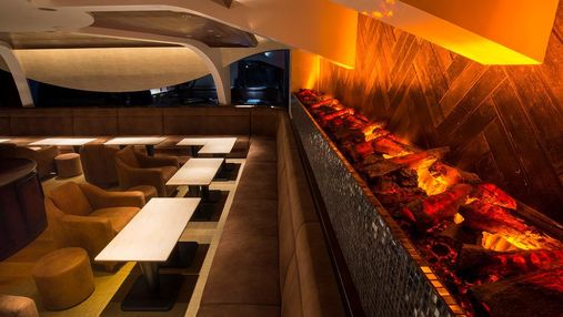 Каміни в інтер’єрі: як виглядають готелі і ресторани з таким дизайном