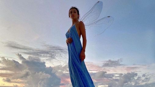 Екатерина Кухар позировала в синем платье на Мальдивах: фото на фоне океана