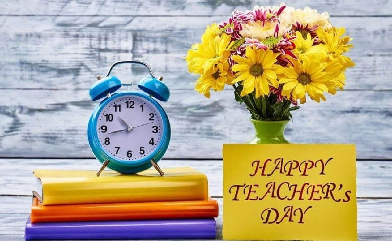 Привітання з Днем вчителя Привітання з Днем вчителя